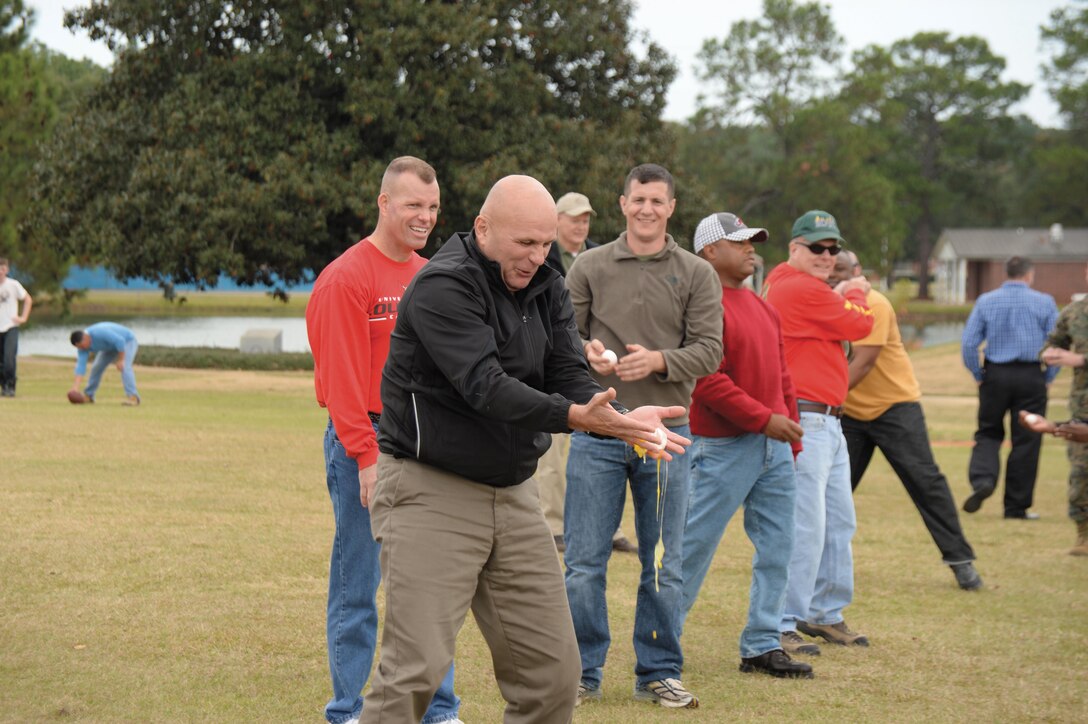 Marine Corps Logistics Base Albany officials celebrated their employees’ achievements during the Base Employee Recognition Day at Covella Pond, Nov. 21.
Col. Don Davis, commanding officer, and Sgt. Maj. Conrad Potts, sergeant major, presented numerous awards to civilian-Marines and Marines.
After a picnic-style lunch of chicken, hot dogs, cole slaw, chips and brownies, employees tested their mettle in the egg toss, dizzy izzy, skiing and carry relays as well as the tug of war. 
Employees also fellowshipped and met new members.
