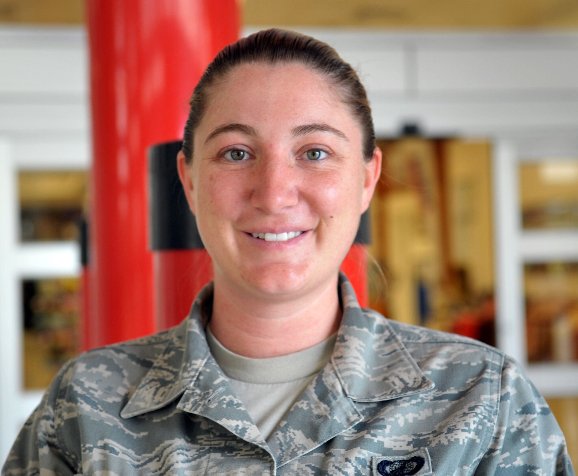 U.S. Air Force Senior Airman Annamaria Al Dabbagh comes from a diverse family and doesn’t have a specific tradition but likes to get together with friends and family for a big potluck, watch football or travel. (U.S. Air Force photo by Naoto Anazawa)