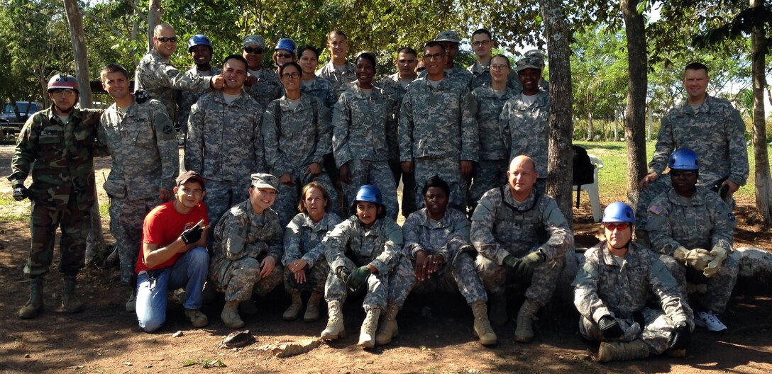Members of Joint Task Force-Bravo's Medical Element took part in a team building exercise in Comayagua, Honduras, Nov. 21-22, 2013.  During the exercise, MEDEL members worked together as a team to overcome several physically demanding obstacles in order to enhance camaraderie and unit cohesion.  (Photo by U.S. Army Sgt. Courtney Kreft)