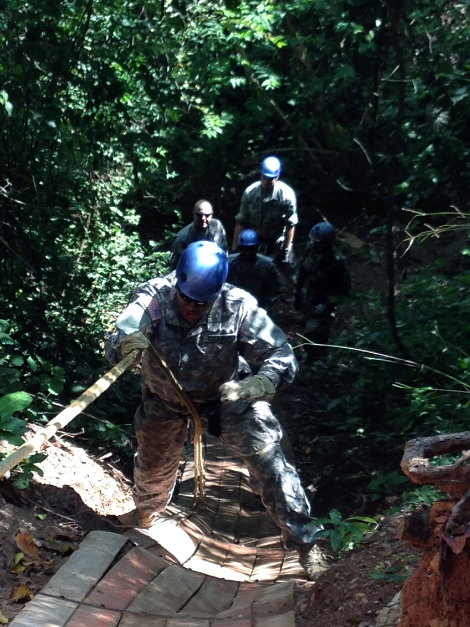 Members of Joint Task Force-Bravo's Medical Element took part in a team building exercise in Comayagua, Honduras, Nov. 21-22, 2013.  During the exercise, MEDEL members worked together as a team to overcome several physically demanding obstacles in order to enhance camaraderie and unit cohesion.  (Photo by U.S. Army Sgt. Courtney Kreft)