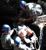 Members of Joint Task Force-Bravo's Medical Element took part in a team building exercise in Comayagua, Honduras, Nov. 21-22, 2013.  During the exercise, MEDEL members worked together as a team to overcome several physically demanding obstacles in order to enhance camaraderie and unit cohesion.  (Photo by U.S. Army Sgt. Courtney Kreft)
