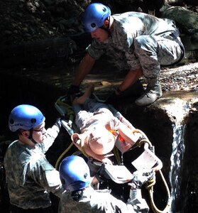 Members of Joint Task Force-Bravo's Medical Element took part in a team building exercise in Comayagua, Honduras, Nov. 21-22, 2013.  During the exercise, MEDEL members worked together as a team to overcome several physically demanding obstacles in order to enhance camaraderie and unit cohesion.  (Photo by U.S. Army Sgt. Courtney Kreft)