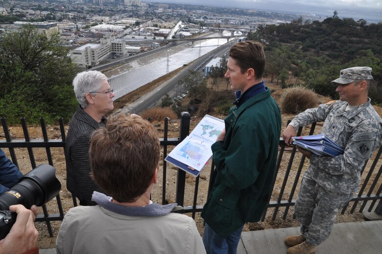 Corps officials brief EPA Administrator Gina McCarthy (left) on Los Angeles County Drainage Area projects during her visit to a Los Angeles River overlook point in Elysian Park Nov. 21. The newly appointed EPA chief visited Los Angeles to get a first-hand view of LA River revitalization efforts.