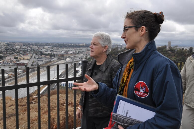 Los Angeles District Planning Chief Josephine Axt (right) discusses potential Los Angeles River ecosystem restoration efforts with EPA Administrator Gina McCarthy at Elysian Park overlooking the Arroyo Seco confluenece during the EPA chief's visit Nov. 21. McCarthy visited Los Angeles to view first hand river revitalization and ongoing cleanup efforts.
