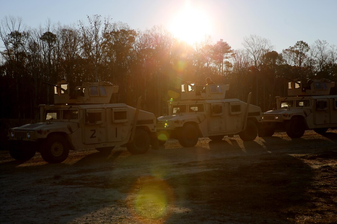 Marines with India Company, 3rd Battalion, 8th Marine Regiment prepare to begin a range aboard Fort Pickett, Va., Nov. 14, 2013. The range was part of a training exercise 3rd Bn., 8th Marines conducted in preparation for an upcoming deployment to parts of Europe and Africa. 