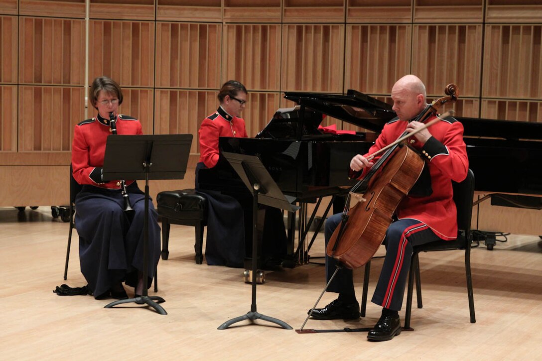 In honor of the 40th anniversary of women joining the Marine Band, “The President’s Own” presents a special recital on Nov. 24. 2013, showcasing the women of today’s Marine Band performing music composed almost entirely by women. The program includes Libby Larsen’s Brazen Overture and Yellow Jersey, Joan Tower’s Platinum Spirals, and Jennifer Higdon’s Steeley Pause. In true Marine fashion, the program concluded with Louis Saverino’s March of the Women Marines, conducted by Assistant Director Capt. Michelle A. Rakers. (U.S. Marine Corps photo by MSgt Kristin S. duBois/released)
