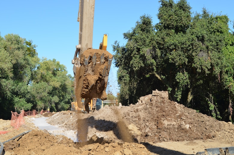 Work continues Oct. 2, 2013, on 3,300 feet of seepage cutoff wall along the north bank of the American River in north Sacramento, Calif. Completion is targeted for mid-October. Construction crews for the U.S. Army Corps of Engineers Sacramento District are helping ensure the levee's height and slope will be brought back to pre-construction levels by November 1 – in time for the rainy season.