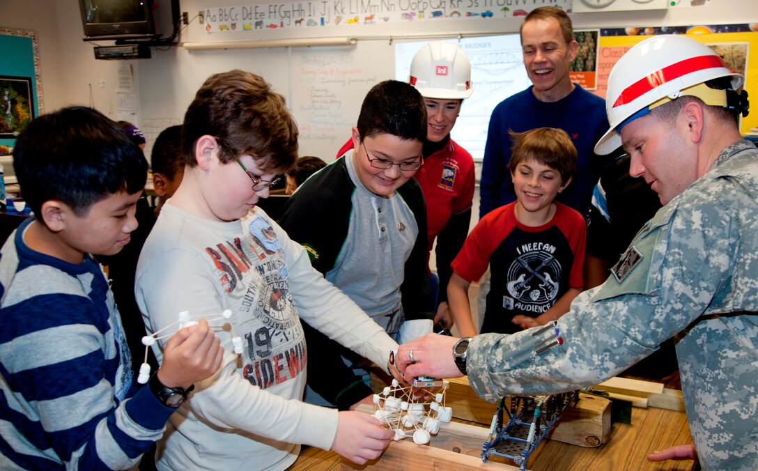 Maj. Mark DeRocchi, deputy commander of the Alaska District, and a few other Corps employees visited with students of Mount Spurr, Ursa Major and Ursa Minor Elementary schools during the week of Nov.18-22 to encourage their studies in science, technology, engineering and mathematics, also known as STEM. Students learned about the U.S. Army Corps of Engineers, the roles of its different divisions and the Corps’ contribution to their community. Using toothpicks and marshmallows, the children got to build their own bridge and test its strength using toy cars with a time limit of 10 minutes. 