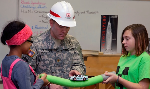 Maj. Mark DeRocchi, deputy commander of the Alaska District, and a few other Corps employees visited with students of Mount Spurr, Ursa Major and Ursa Minor Elementary schools during the week of Nov.18-22 to encourage their studies in science, technology, engineering and mathematics, also known as STEM. Students learned about the U.S. Army Corps of Engineers, the roles of its different divisions and the Corps’ contribution to their community. Using toothpicks and marshmallows, the children got to build their own bridge and test its strength using toy cars with a time limit of 10 minutes. 