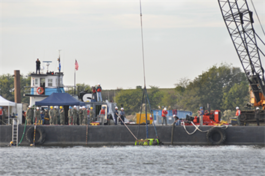 Archeologists working for the U.S. Army Corps of Engineers, Savannah District, aided by divers and salvage operations teams from the U.S. Navy, retrieved a 64-square foot section of a Civil War ironclad warship from the bottom of the Savannah River the evening of Nov. 12. 