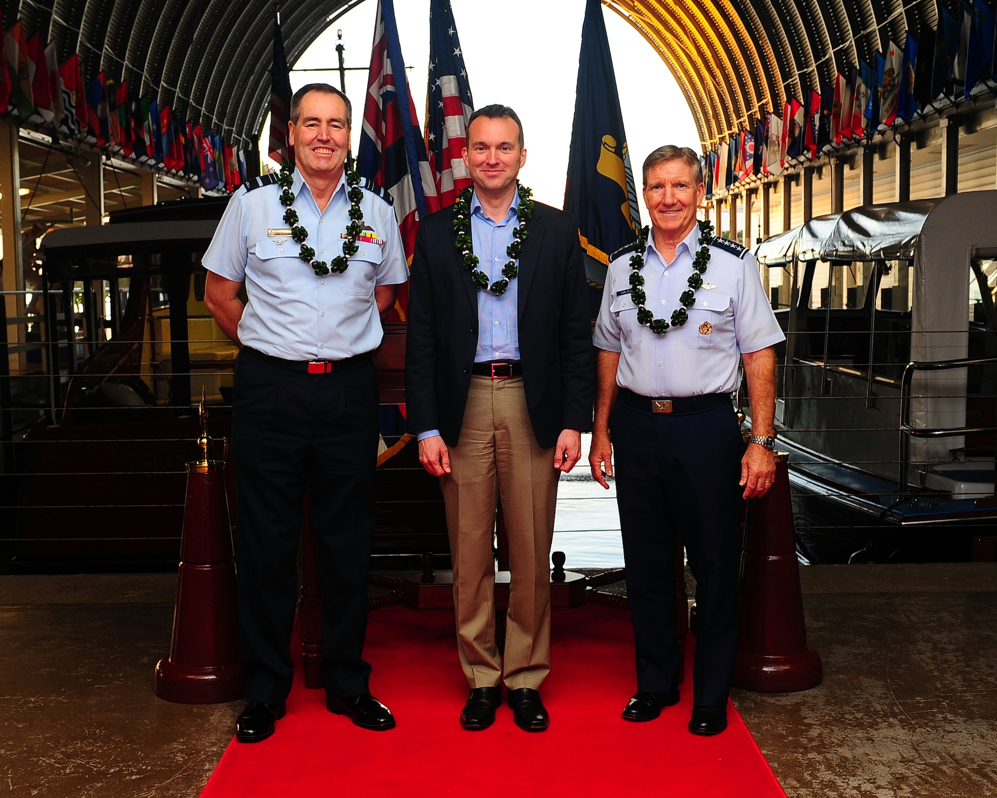 From left, Air Marshall Geoff Brown, Royal Australian Air Force Chief of Air Force; Acting Secretary of the Air Force Eric Fanning; and Gen. Hawk Carlisle, Pacific Air Forces commander, stand in front of the Pacific Fleet Boathouse before a visit to the USS Arizona Memorial, Pearl Harbor, Hawaii, Nov. 23, 2013.  Brown also took part in the dedication ceremony of an RAAF F-111 at the Pacific Aviation museum that same day. Brown is a former F-111 pilot and was instrumental in the development and modernization of the RAAF's F-111 fleet; he played a key role in both the RAAF donating the aircraft to the museum and the dedication ceremony itself.  (U.S. Air Force photo/Tech. Sgt. LuCelia Ball)