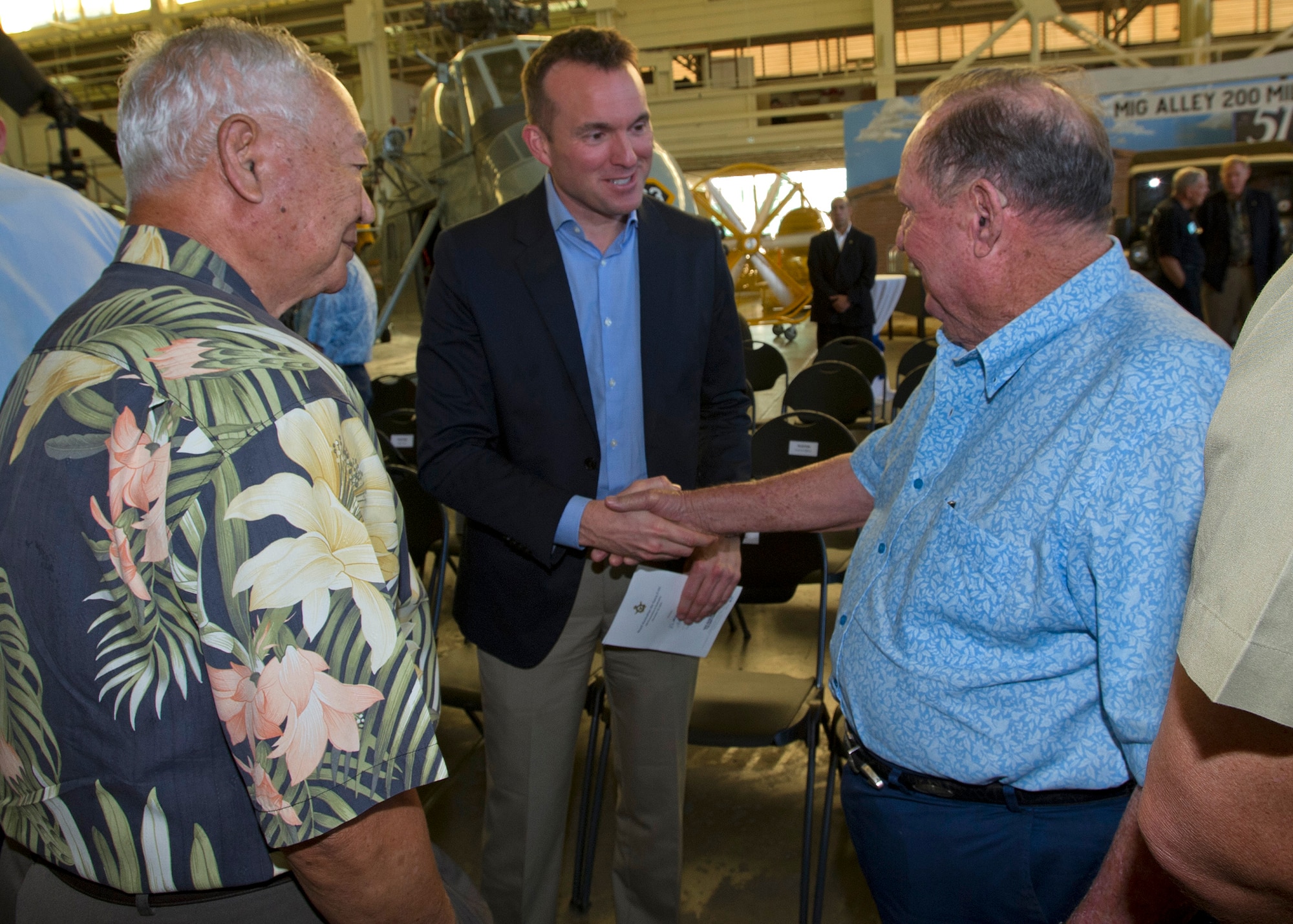 Acting Secretary of the Air Force Eric Fanning, middle, shakes hands with Pacific Air Forces Civilian Advisory Council members at a Royal Australian Air Force F-111C dedication ceremony at the Pacific Aviation Museum, Ford Island, Hawaii, Nov.23, 2013. Of the alliance between the U.S. and Australia, Admiral Samuel Locklear, Pacific Command commander, said “the U.S.-Australian alliance is an anchor of peace and stability in the Indo-Asia-Pacific, and promotes economic development and integration, good governance, and the rule of law. USPACOM coordinates closely with our Australian partners to promote security in the region.” (U.S. Air Force photo/Tech Sgt. Jerome S. Tayborn/Released)