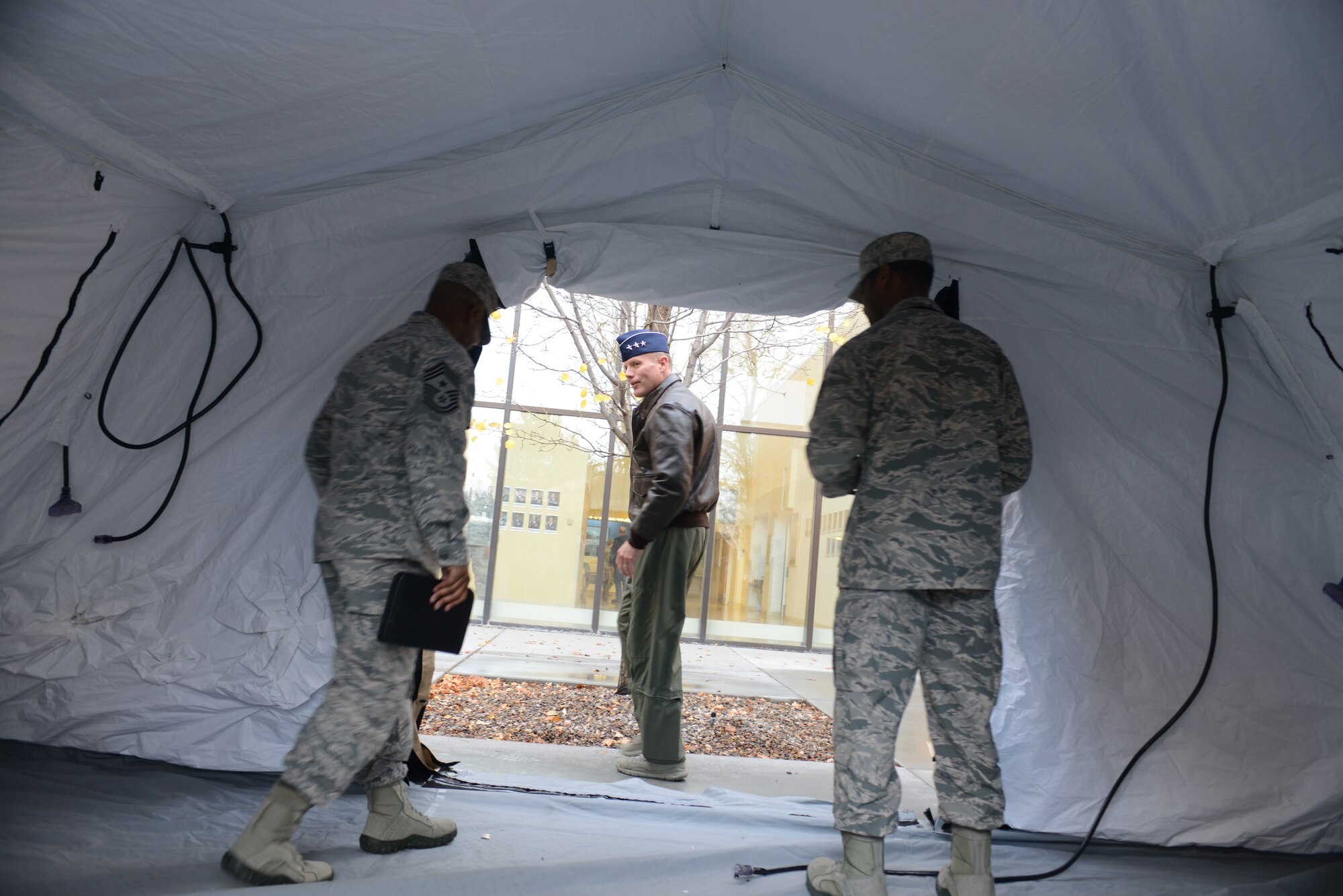 U.S. Air Force Lt. Gen. Tod Wolters, 12th Air Force (Air Forces Southern) commander, exits a tent Nov. 19, 2013, at Mountain Home Air Force Base, Idaho. General Wolters received a tour of the MHAFB hospital which is a full service 10-bed community-based hospital of more than 397 military and civilian members. (U.S. Air Force photo by Senior Airman Benjamin Sutton/Released)
