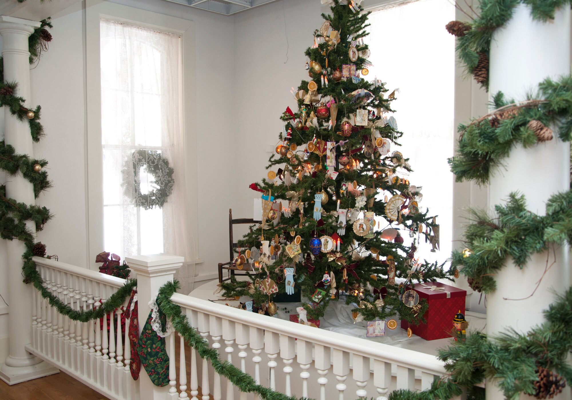 A decorated Victorian-style Christmas tree and decorations greets patrons in the front entrance of the Warren ICBM and Heritage Museum during an open house Nov. 23, 2013. The museum had Victorian Christmas displays and decorations, arts and crafts, period-style candies, photos with Santa and more. (U.S. Air Force photo by Tech. Sgt. Stacy Foster)