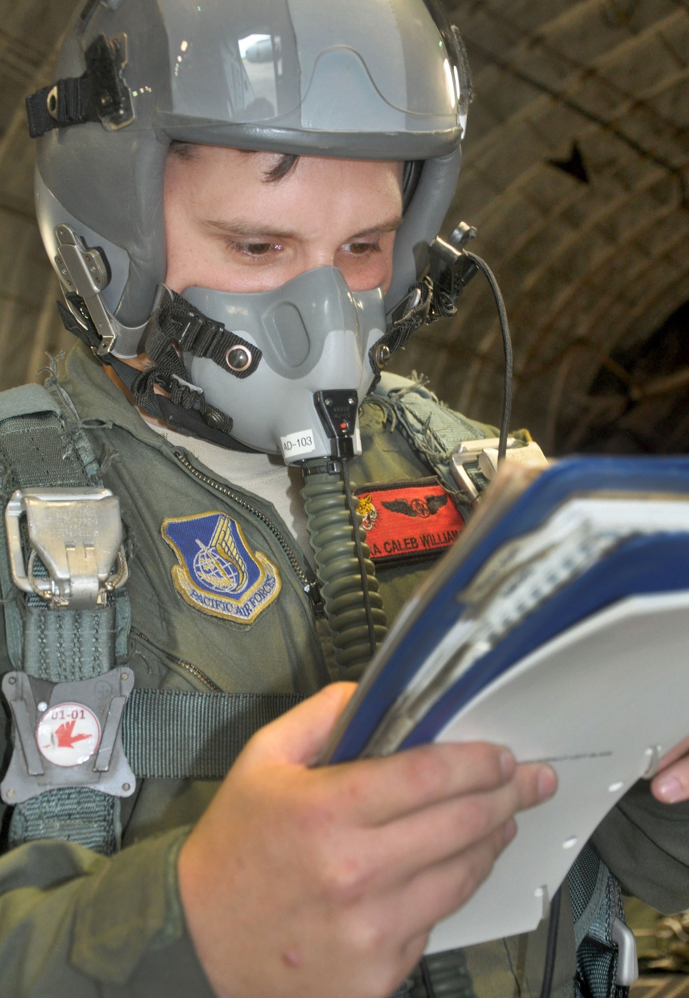 OHAKEA, New Zealand -- Senior Airman Caleb Williams, 517th Expeditionary Airlift Squadron loadmaster, performs preflight checks Nov. 17 in preparation for a high-altitude, low-opening personnel drop during the multilateral RNZAF-sponsored tactical airlift exercise, Kiwi Flag, at Royal New Zealand Air Force Base Ohakea, New Zealand. Kiwi Flag personnel are supporting Exercise Southern Katipo -- held in New Zealand’s South Island. (U.S. Air Force photo by Senior Master Sgt. Denise Johnson/Released)