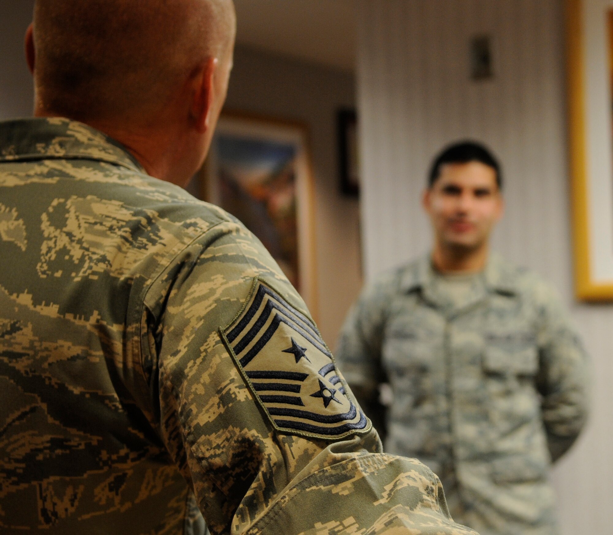 Chief Master Sgt. Brian Hornback, Air Force Global Strike Command command chief, listens to members of the 509th Medical Group during his visit to Whiteman Air Force Base, Mo., Nov. 13, 2013. This was Hornback’s first stop to all AFGSC bases before his retirement in 2014. (U.S. Air Force photo by Staff Sgt. Alexandra M. Boutte/Released)