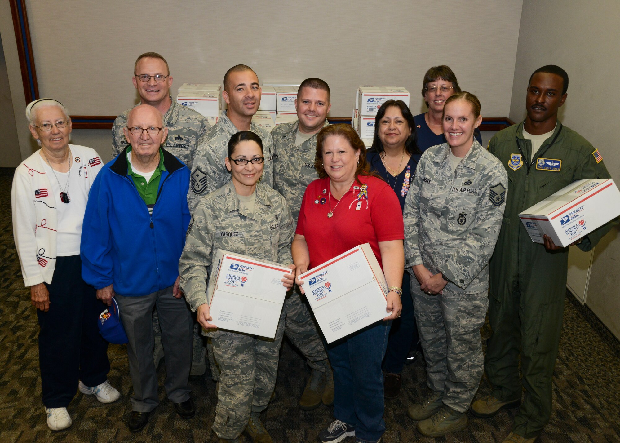 Members of the Antelope Valley Blue Star Mothers Chapter 14 partnered with the Edwards Airmen and Family Readiness Center to send care packages to deployed servicemembers for the holidays. (U.S. Air Force Photo by Rebecca Amber)