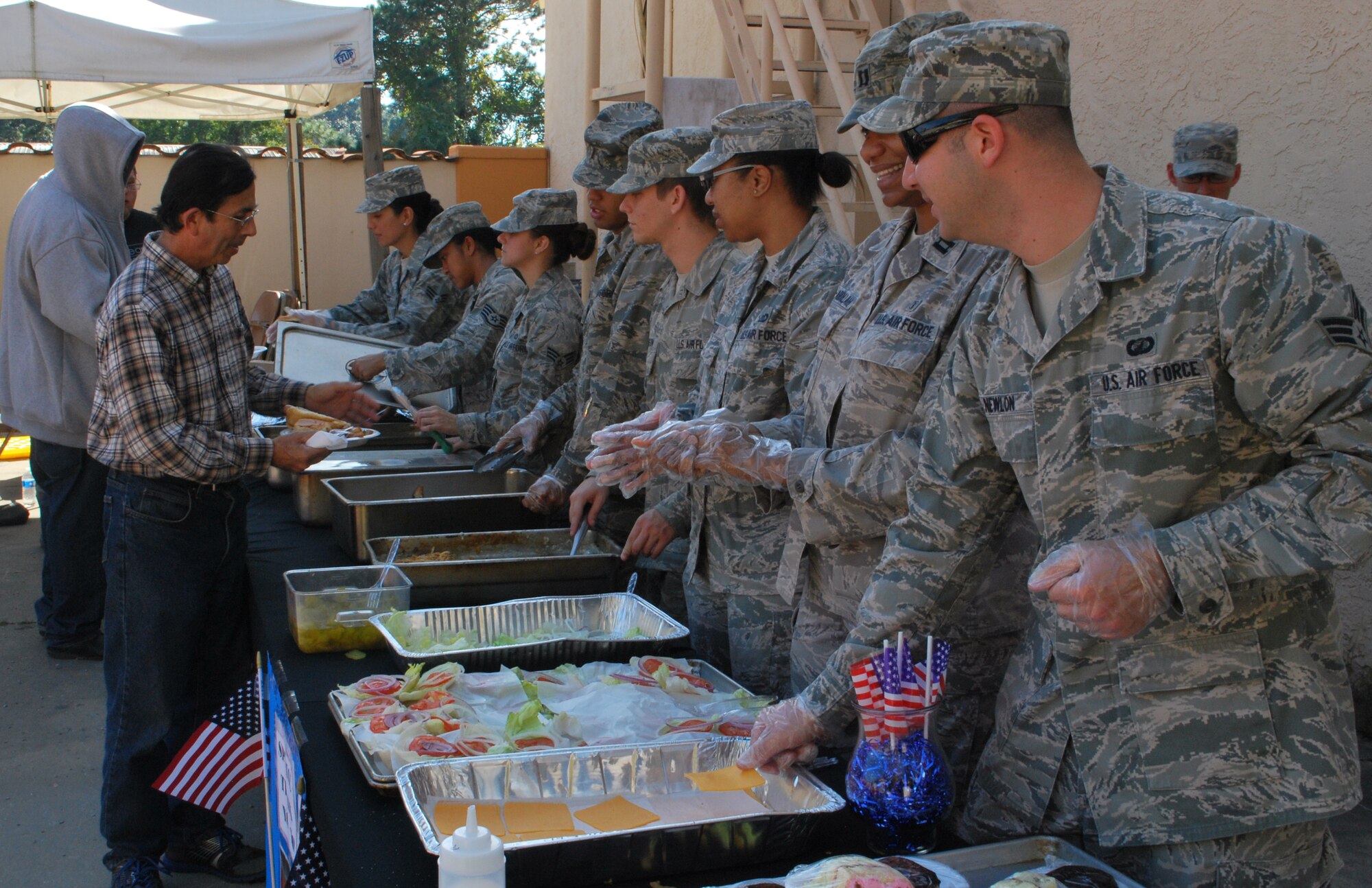 Team Tyndall Airmen serve meals for veterans at the Panama City Rescue Mission Nov. 11. The Veteran’s Day ceremony provided free meals to homeless veterans.