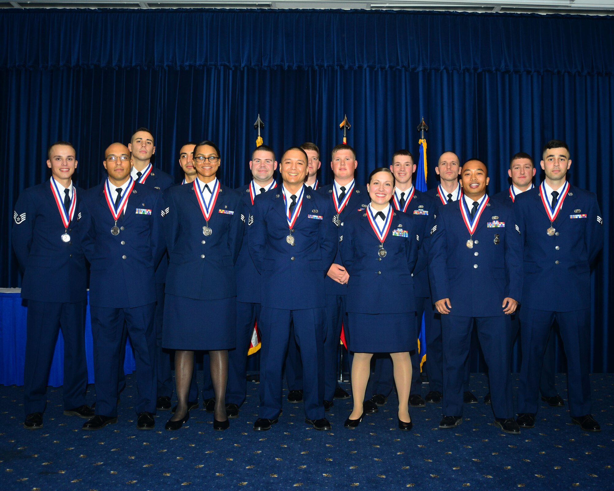 Members of Airman Leadership School Class 14-1 pose for a group photo after completing thier first professtional military education course. ALS is the first PME class Airmen take focusing on the responsibilities of becoming a supervisor. (U.S. Air Force photo by Staff Sgt. Eric Summers Jr.)