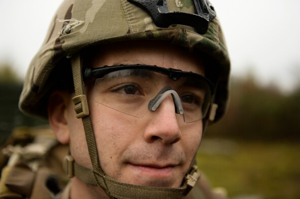 SPANGDAHLEM AIR BASE, Germany--Staff Sgt. Paul Orosz, a 52nd Civil Engineer Squadron Explosive Ordnance Disposal journeyman from Washington D.C., looks at the EOD range after a pumpkin demo training session Nov. 6, 2013. Orosz was the team chief on demo operations for the training. (U.S. Air Force photo by Senior Airman Rusty Frank/Released)