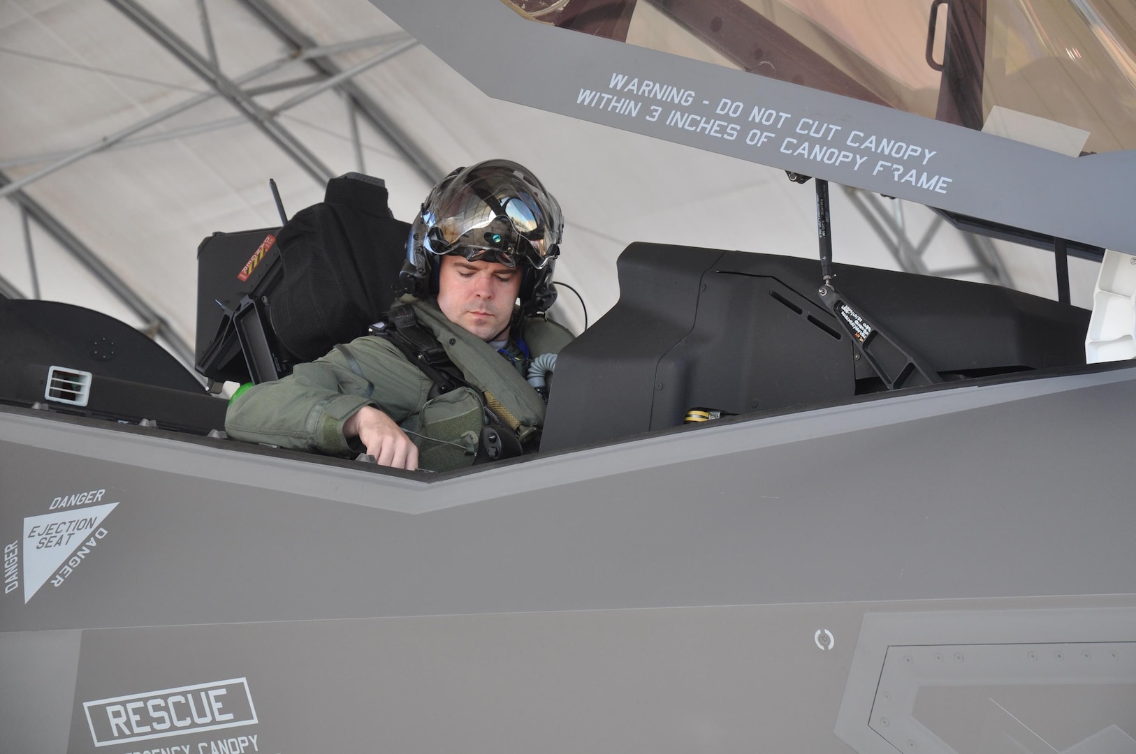 Air National Guard Maj. Jay Spohn performs pre-flight tasks in an F-35A Lightning II joint strike fighter in July during preparations to become the Guard’s first F-35 instructor pilot. He finished his last of six flights Aug. 3, 2012 to become a part of aviation history. Spohn is a Florida National Guard member and is embedded in the 33d Fighter Wing at Eglin Air Force Base where he is responsible for training up the fighter pilots who will fly the fifth-generation F-35 and will carry the U.S. Air Force into the next 50 years of air superiority.