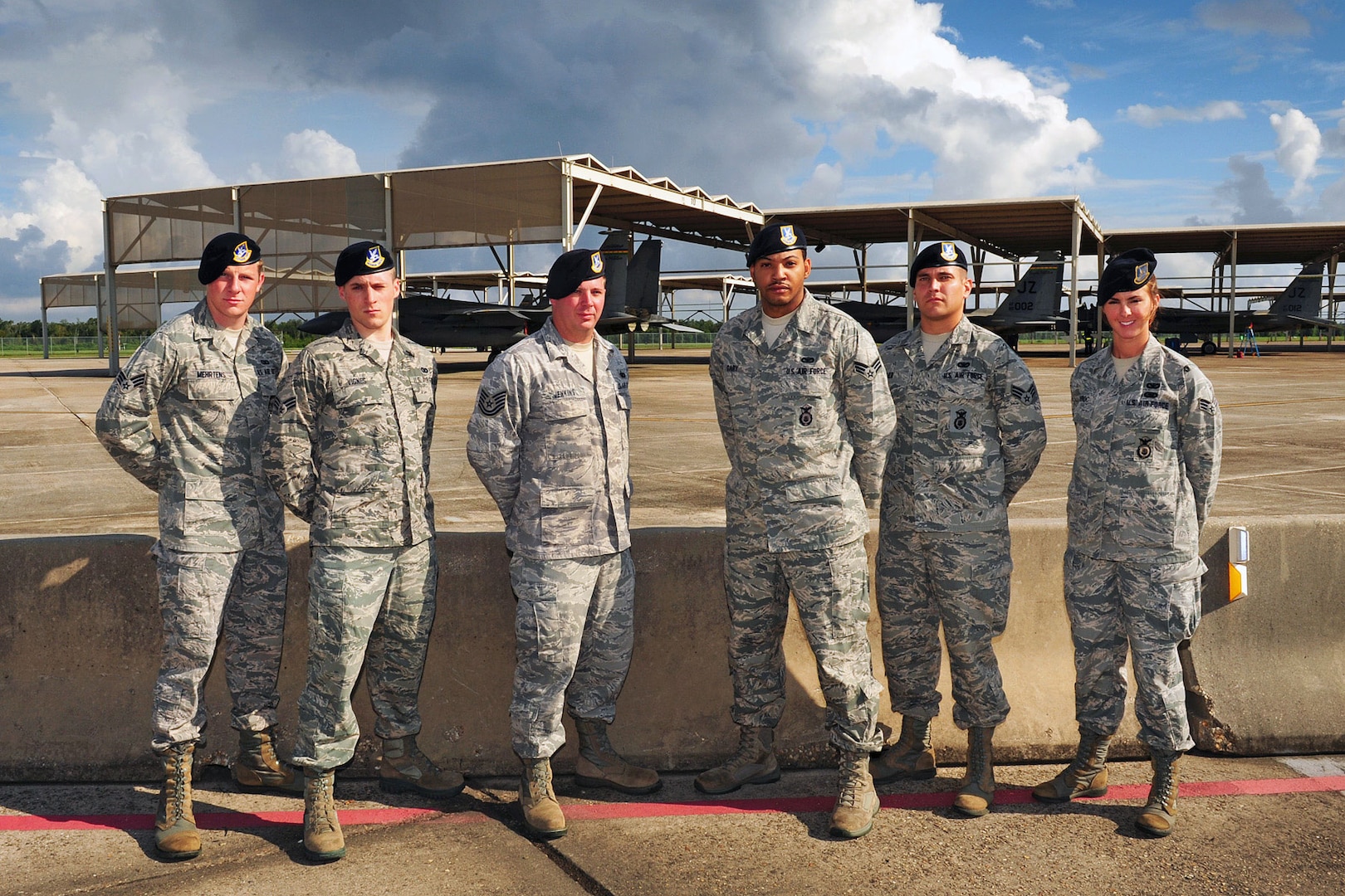 Airmen with the Louisiana Air National Guard's 159th Security Forces Squadron were recognized for their heroism at Castle Rock Lake, Wis., when they saved the lives of three people injured at the lake. The Airmen pictured include: Senior Airmen Steven A. Mehterns, Senior Airmen Jared M. Vignes, Tech. Sgt. Reese A. Jenkins, Senior Airmen Russell C. Gary and Senior Airmen Raenell M. Dubroc. (U.S. Air Force photo by 