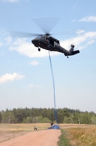 Colorado Army National Guard Soldiers use a UH-60 Black Hawk helicopter to help move an estimated 7,000 to 9,000 marijuana plants -- nearly $15 million street value -- from two remote areas near Rye, Colo., Aug. 15, 2012. Members of the Colorado National Guard Joint Counter-Drug Task Force's Drug Interdiction section were called to assist the Pueblo County Sheriff's Office move the plants, which were growing in steep terrain that's impassible by motor vehicle. The operation is one of the largest marijuana busts in Colorado.