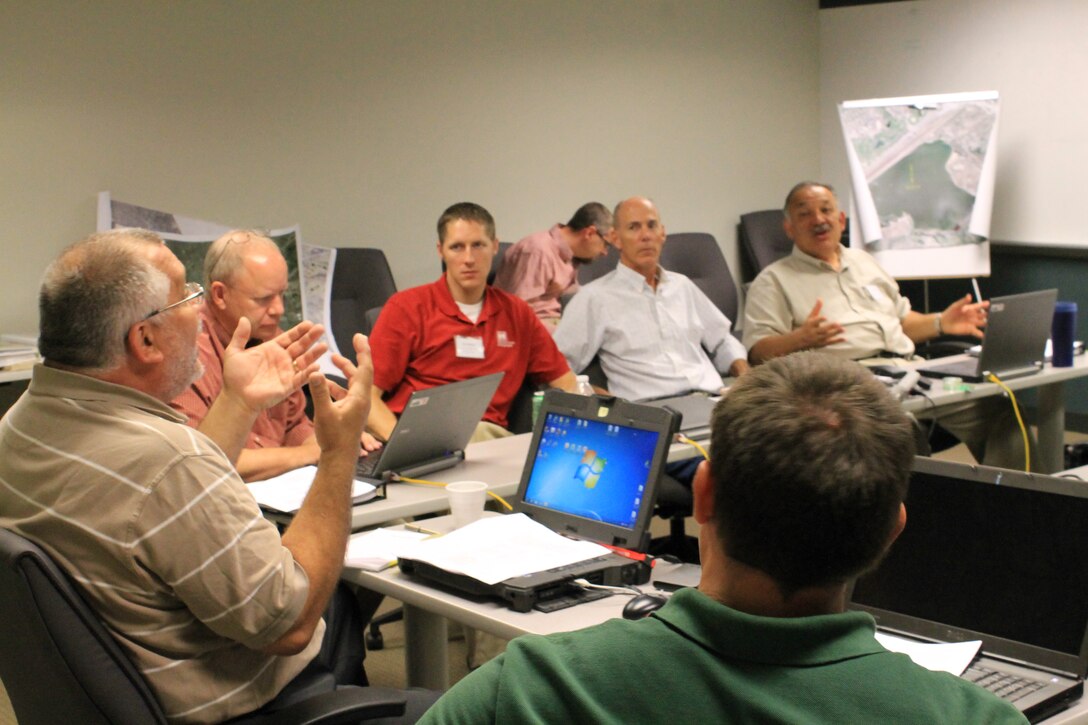 Cherry Creek Dam Safety Exercise participants were taken through a high water scenario at Cherry Creek Dam, which was developed through the collaboration of Omaha District personnel representing offices such as Dam Safety, Emergency Management, and Water Management and the U.S. Army Corps of Engineers Readiness Support Center located in Mobile, Ala. (Photo by Eileen Williamson)