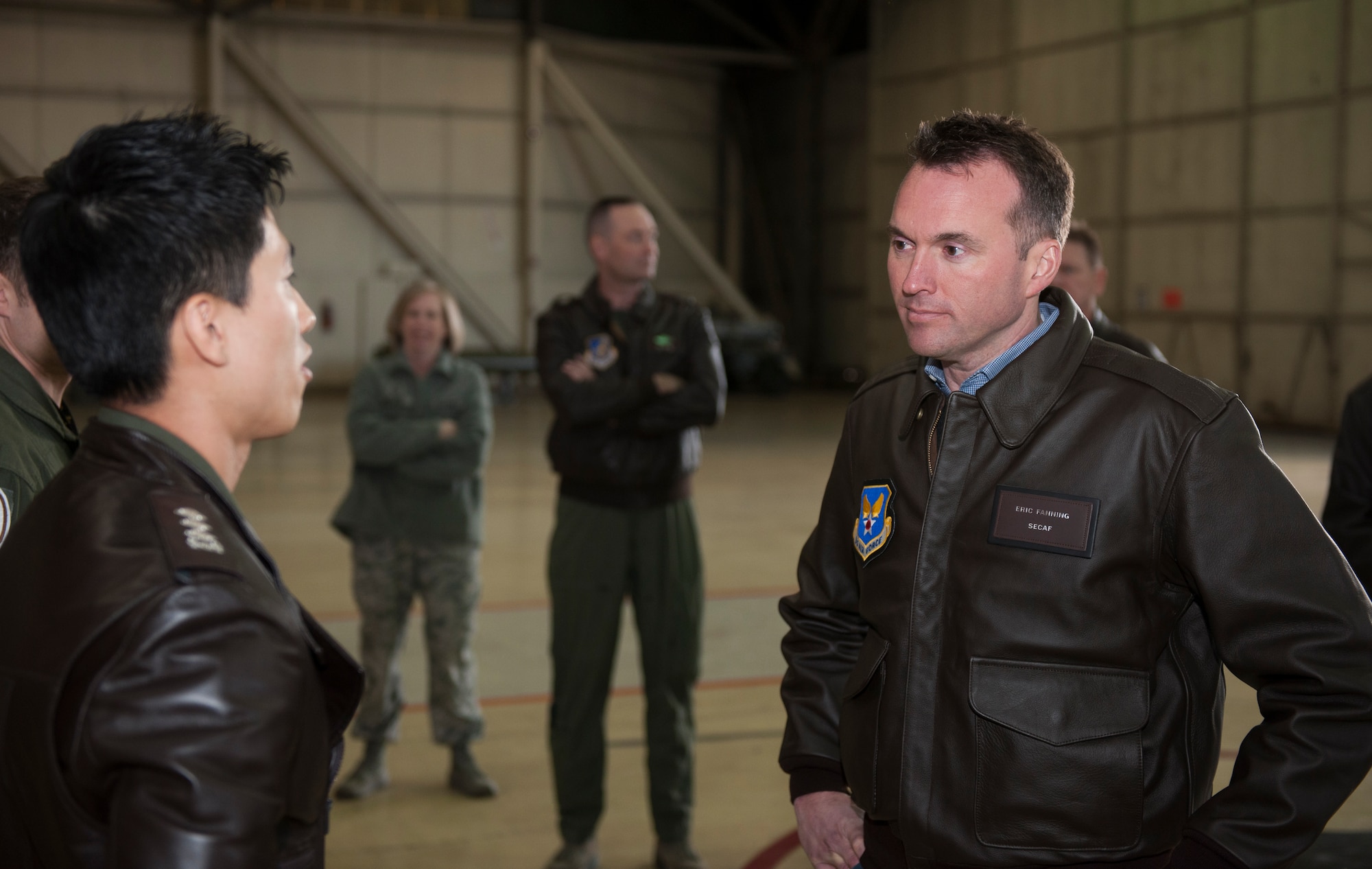 Acting Secretary of the Air Force Eric K. Fanning listens to a Republic of Korea air force officer explain the U.S. and ROK partnership at Kunsan Air Base, Republic of Korea, Nov. 26, 2013. The secretary visited the Wolf Pack to get a better look at Kunsan’s mission of defending the base, accepting follow-on forces and taking the fight North. (U.S. Air Force photo by Senior Airman Armando A. Schwier-Morales/Released)  