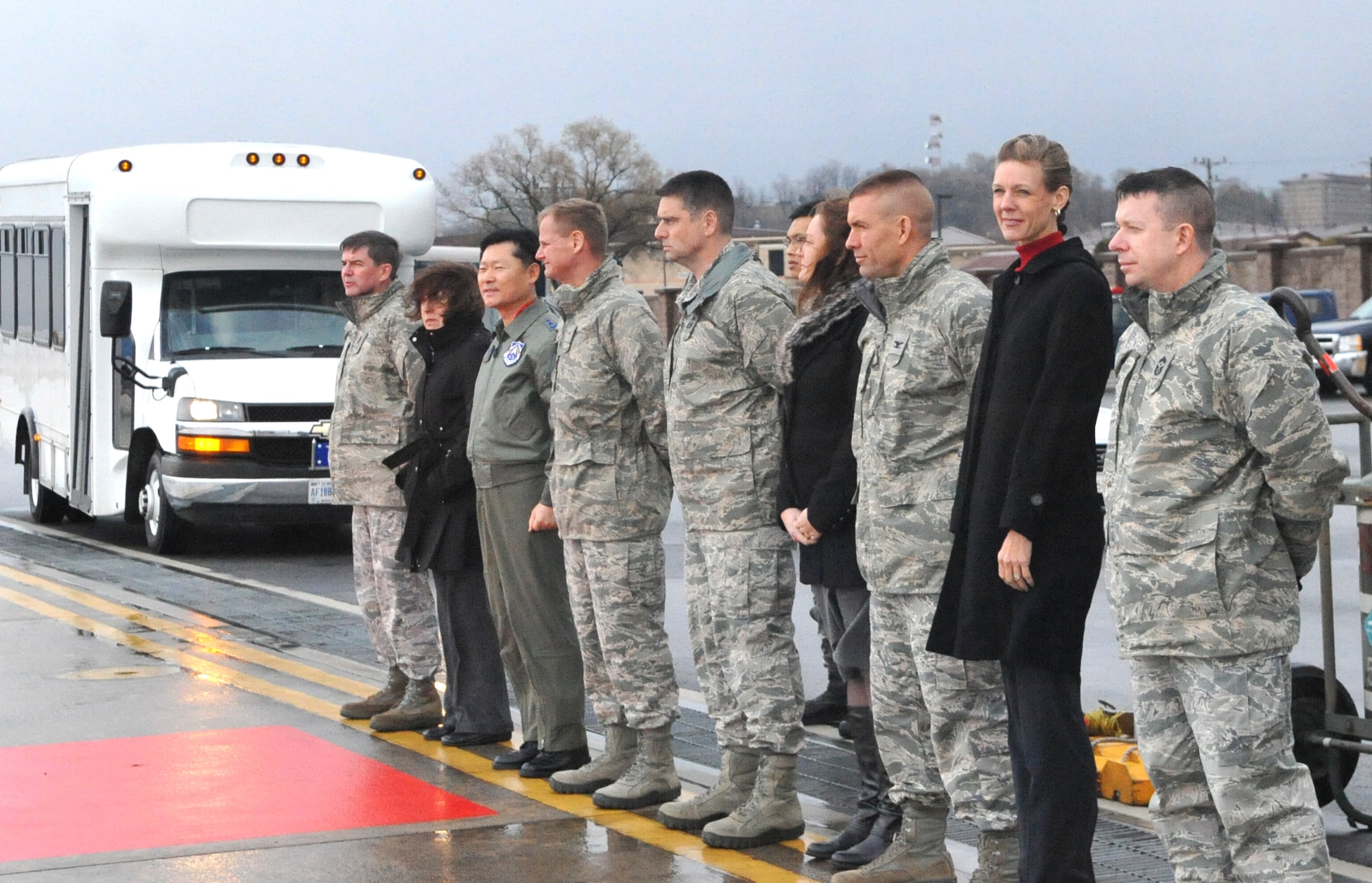 Osan leadership lines up to salute the arrival of Acting Secretary of the Air Force Eric Fanning at Osan Air Base, Republic of Korea, Nov. 25, 2013. Fanning toured the 607th Air and Space Operations Center and the 694th Intelligence, Surveillance and Reconnaissance Group before holding an all call at the base theater. (U.S. Air Force photo/Airman 1st Class Ashley J. Thum)