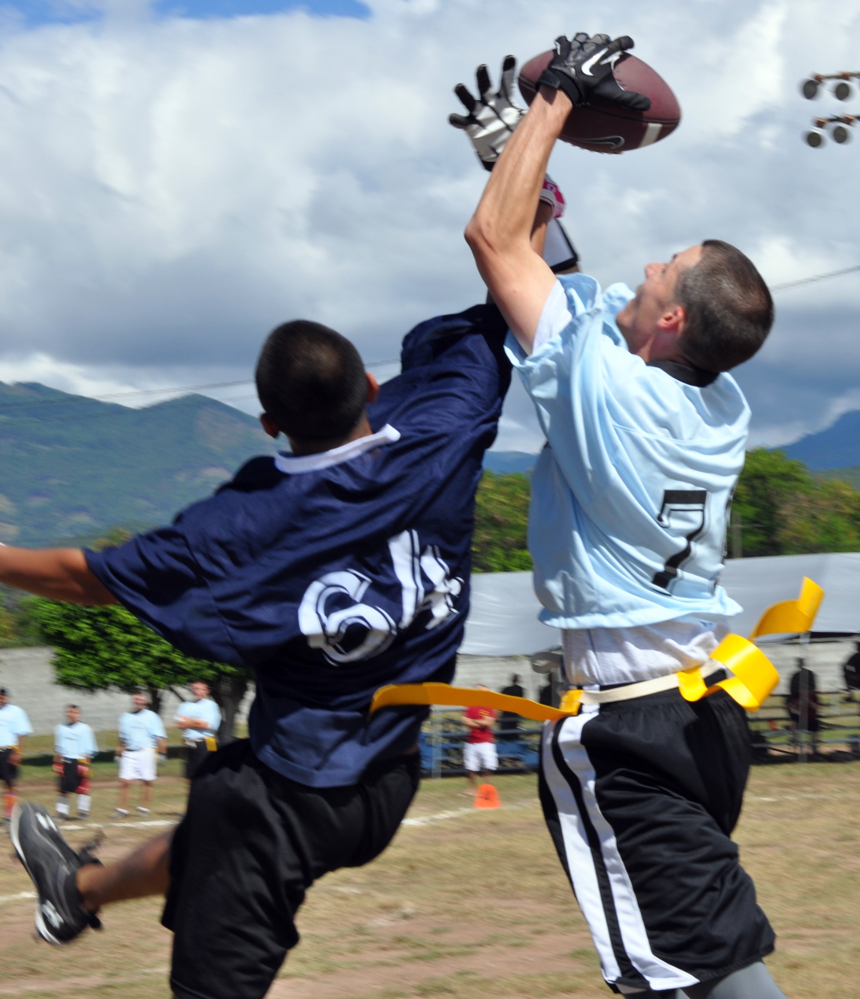 Members of Joint Task Force-Bravo participated in the annual "Turkey Bowl" flag football game. The game pits Airmen against Soldiers in a friendly competition between Army and Air Force. This year, the Air Force took home the Turkey Bowl trophy, defeating the Army in overtime by a score of 25-19. The game served to increase camaraderie among the two services while promoting overall physical fitness. (U.S. Air Force photo by Capt. Zach Anderson)