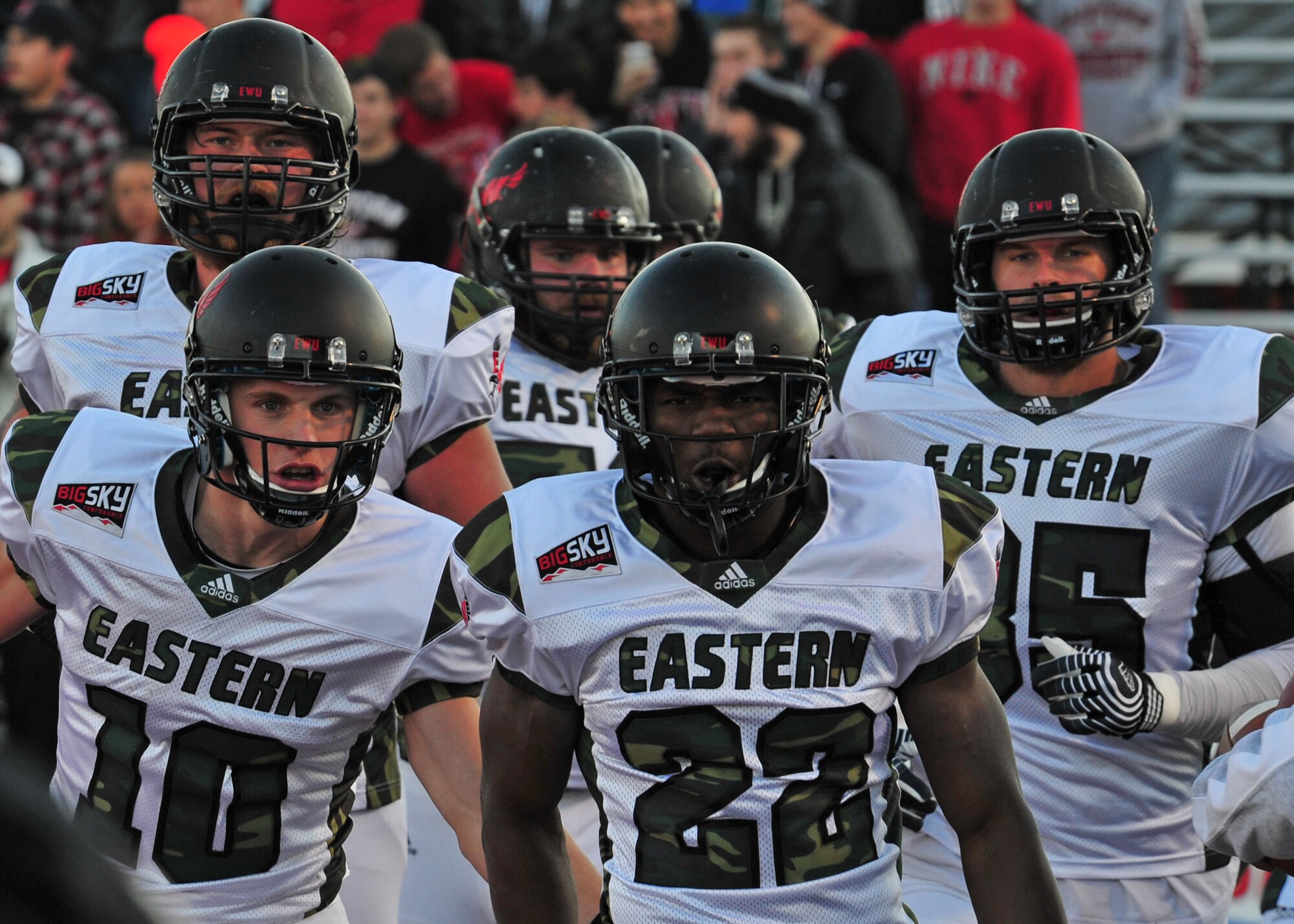 Members of the Eastern Washington University football team celebrate after scoring a touchdown during the EWU military appreciation game at Roos Field in Cheney, Wash., Nov. 23, 2013. (U.S. Air Force photo by Senior Airman Taylor Curry/Released) 