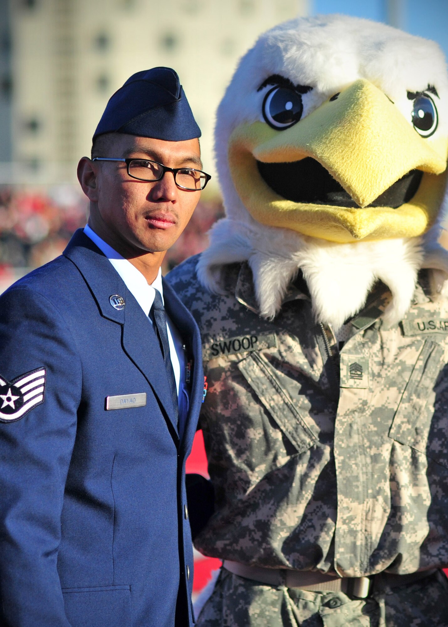Staff Sgt. Jonathan Dayao, 92nd Maintenance Group, appears as an honorary captain at the Eastern Washington University military appreciation game at Roos Field in Cheney, Wash., Nov. 23, 2013. Military families were given free admission to the game and invited to a BBQ tailgate before the game. (U.S. Air Force photo by Senior Airman Taylor Curry/Released) 