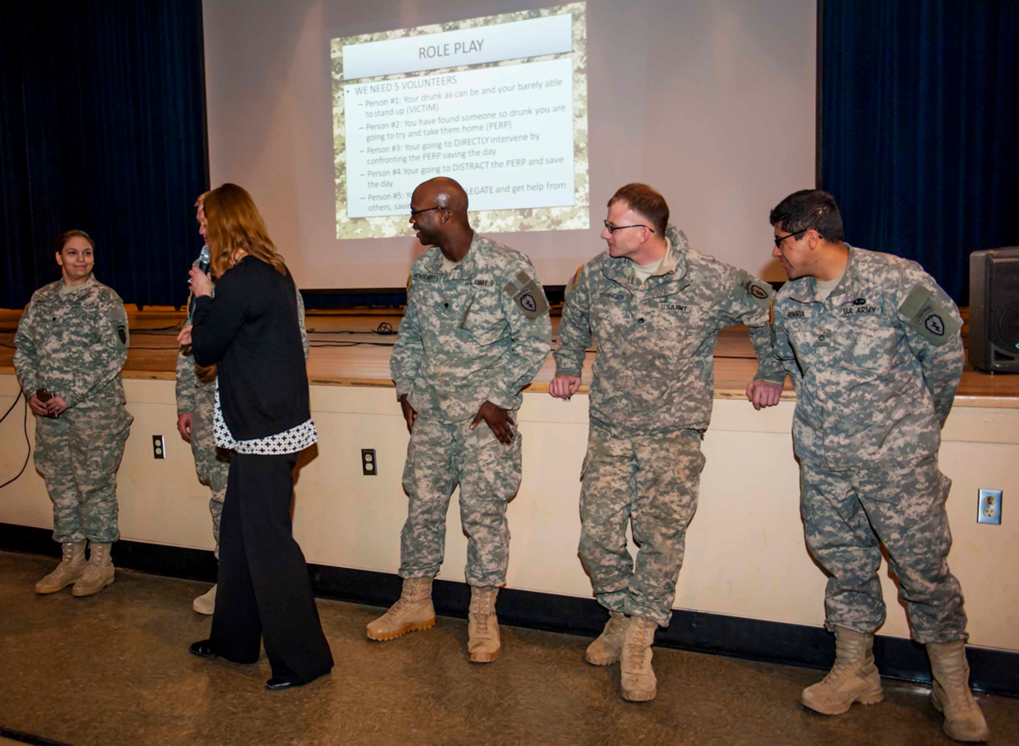 Soldiers participate in a scenario during bystander intervention training on Joint Base Elmendorf-Richardson Nov. 19. The Soldiers performed a scenario as a way to intervene hands on in a violent or uncomfortable situation. (U.S. Air Force photo/Airman 1st Class Tammie Ramsouer)