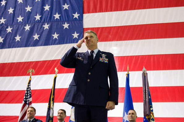 Col. Barry Gorter receives his first salute as commander of the 123rd Airlift Wing during a change-of-command ceremony held in the Fuel Cell Hangar at the Kentucky Air National Guard base in Louisville, Ky., Nov. 24, 2013. (U.S. Air National Guard photo by Airman 1st Class Joshua Horton)