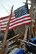 A United States flag flies from the ruble of a home destroyed in Moore, Okla. A powerful EF-5 tornado touched down approximately three miles south of Tinker AFB. (U.S. Air Force photo by Maj. Jon Quinlan)