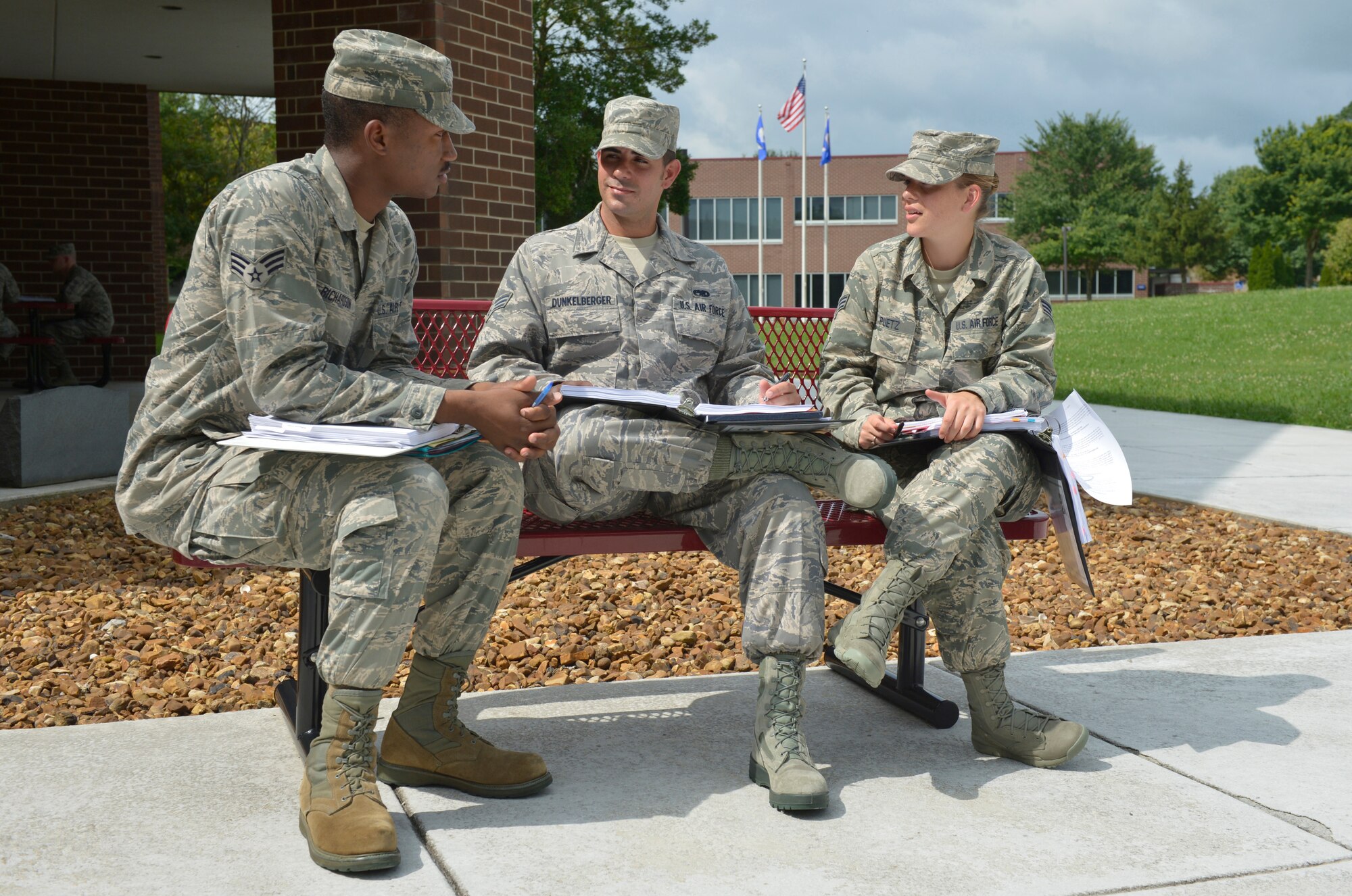 MCGHEE TYSON AIR NATIONAL GUARD BASE, Tenn. - From left, Senior Airmen Ethan W. Richardson, Charles W. Dunkelberger and Maria A. Puetz, attend Airman Leadership School Class 13-6, and participate in group interpersonal communications at the Paul H. Lankford Enlisted Professional Military Education Center at the I.G. Brown Training and Education Center here, July 23, 2013. (U.S. Air National Guard photo by Master Sgt. Kurt Skoglund/Released)