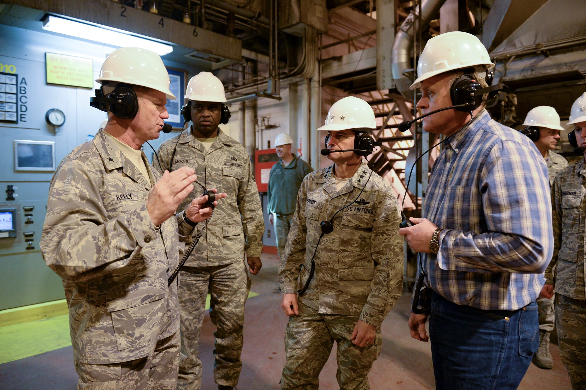U.S. Air Force Lt. Gen. Russell Handy, 11th Air Force commander, Chief Master Sgt. Jerry Moore Jr., 11th AF command chief master sergeant, and Brig. Gen. Mark Kelly, 354th Fighter Wing commander, tour the Central Heat and Power Plant with Marty Overlin, 354th Civil Engineer Squadron central heat and power plant superintendent, Nov. 21, 2013 , Eielson Air Force Base, Alaska. Handy and Moore stopped at Eielson to visit the Airmen and familiarize themselves with Eielson's unique operations.  (U.S. Air Force photo by Airman 1st Class Peter Reft/Released)
