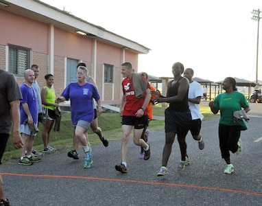 Members of Joint Task Force-Bravo participate in the “2013 MWR Turkey Trot 5K Fun Run & Walk” to kick off the Thanksgiving Day celebrations at Soto Cano Air Base, Honduras, Nov. 26, 2013. (Photo by Ana Fonseca) 
