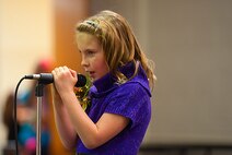 North Plains Elementary School had 35 students participate in the first Denim & Glitz Talent Show Nov. 18. The majority of performances featured talents such as singing, poetry, and choreographed dances. (U.S. Air Force photo/Airman 1st Class Lauren Pitts) 