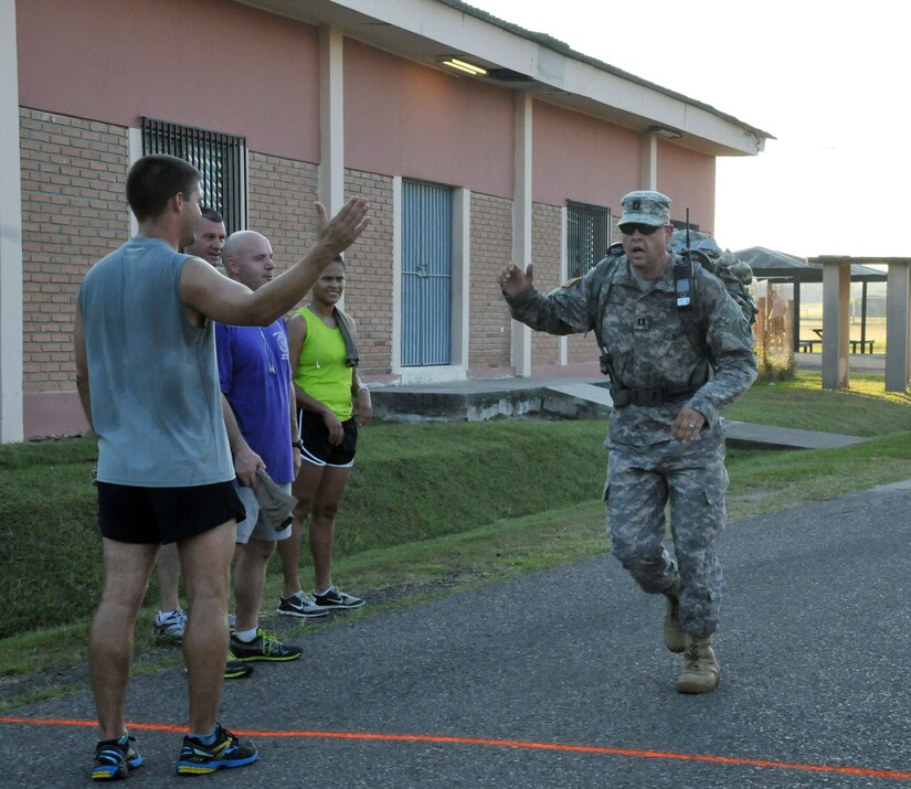 Members of Joint Task Force-Bravo participate in the “2013 MWR Turkey Trot 5K Fun Run & Walk” to kick off the Thanksgiving Day celebrations at Soto Cano Air Base, Honduras, Nov. 26, 2013. (Photo by Ana Fonseca)