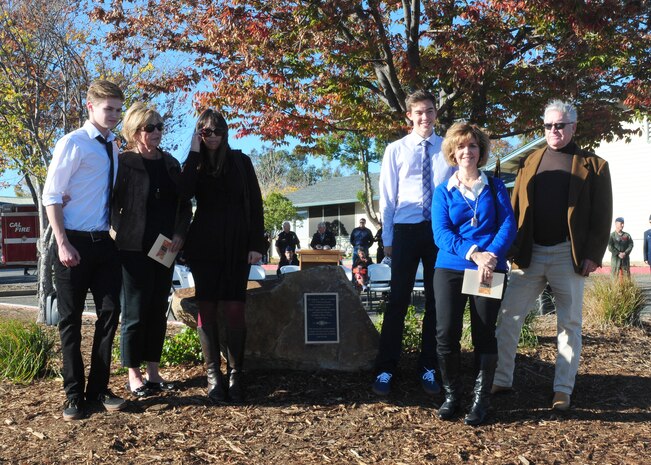 Capt. Randy Roby’s family stands next to the new monument that honors Roby at the Cal-Fire Butte County Headquarters in Oroville, Calif., Nov. 22, 2013. Roby was a U-2 Dragonlady pilot and a Fresno native. (U.S. Air Force photo by Senior Airman Allen Pollard/Released)