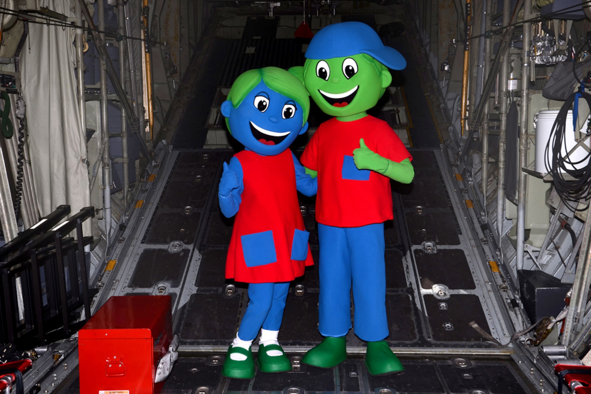 Hope and Will, Children’s Healthcare of Atlanta mascots, tour a Dobbins C-130 aircraft during a base visit Oct. 21. In 2012, the facility treated more than 345,000 children, according to Children’s officials. The goal of Children’s is to make a difference in the lives of kids and the strength of their communities. (U.S. Air Force photo/Don Peek)