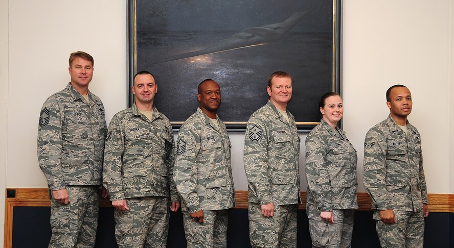 The presidents of Whiteman’s private organizations are pictured at Whiteman Air Force Base, Mo., Nov. 8, 2013. Pictured from left to right: Chief Master Sgt. John Stricklin, Whiteman Chief’s Group; Tech. Sgt. Jesse Guerra, Whiteman Tier Two; Master Sgt. Randolph Wyatt, Whiteman Top Three; Master Sgt. Shawn Cushman, Whiteman First Sergeants Council; 1st Lt. Amanda Zenner, Company Grade Officers Council; and Airman 1st Class Jermaine Walton, Whiteman Airmen Council. The private organizations of Whiteman Air Force Base are always looking for new members. (U.S. Air Force photo by Staff Sgt. Brigitte N. Brantley/Released)