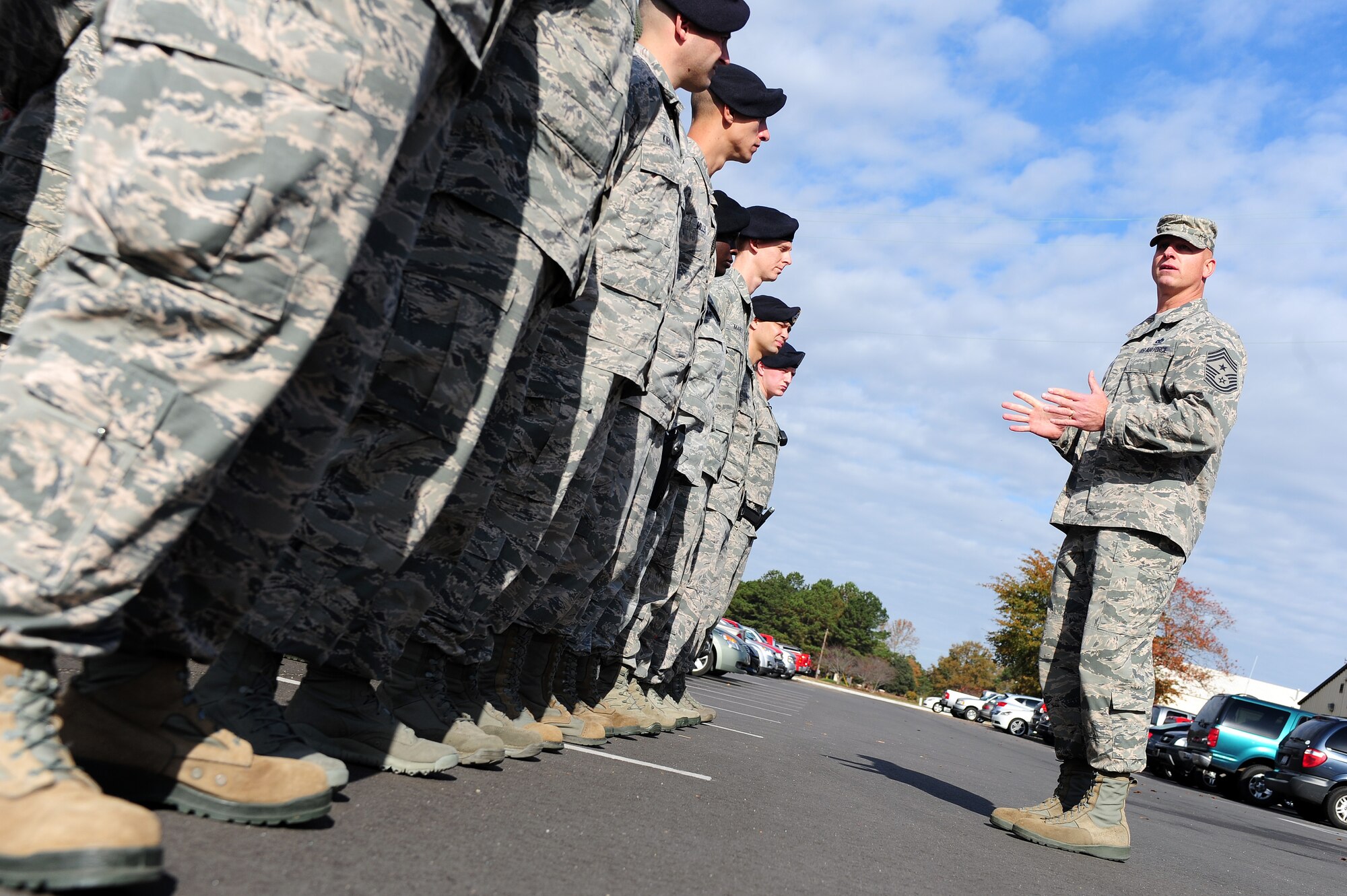 U.S. Air Force Chief Master Sgt. Scott Fuller, Ninth Air Force command chief, addresses members of the 4th Security Forces Squadron during a visit to Seymour Johnson Air Force Base, N.C., Nov. 21, 2013.  Fuller spoke about the significant role Security Forces personnel have and how they contribute to the mission. (U.S. Air Force photo by Airman 1st Class John Nieves Camacho)