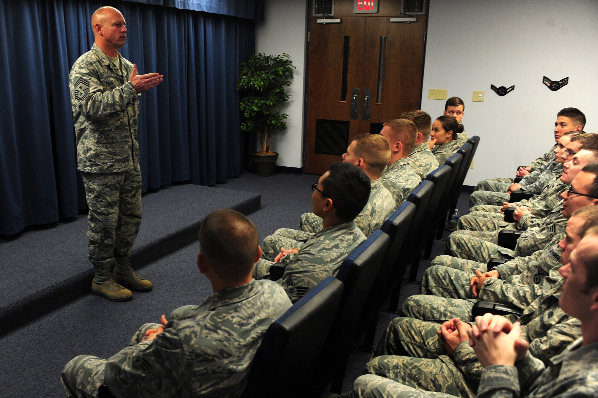 U.S. Air Force Chief Master Sgt. Scott Fuller, Ninth Air Force command chief, speaks to Airman Leadership School Class 14-A at the ALS auditorium at Seymour Johnson Air Force Base, N.C., Nov. 21, 2013. Fuller spent the day visiting with many Airmen from various agencies around base. (U.S. Air Force photo by Airman 1st Class John Nieves Camacho)