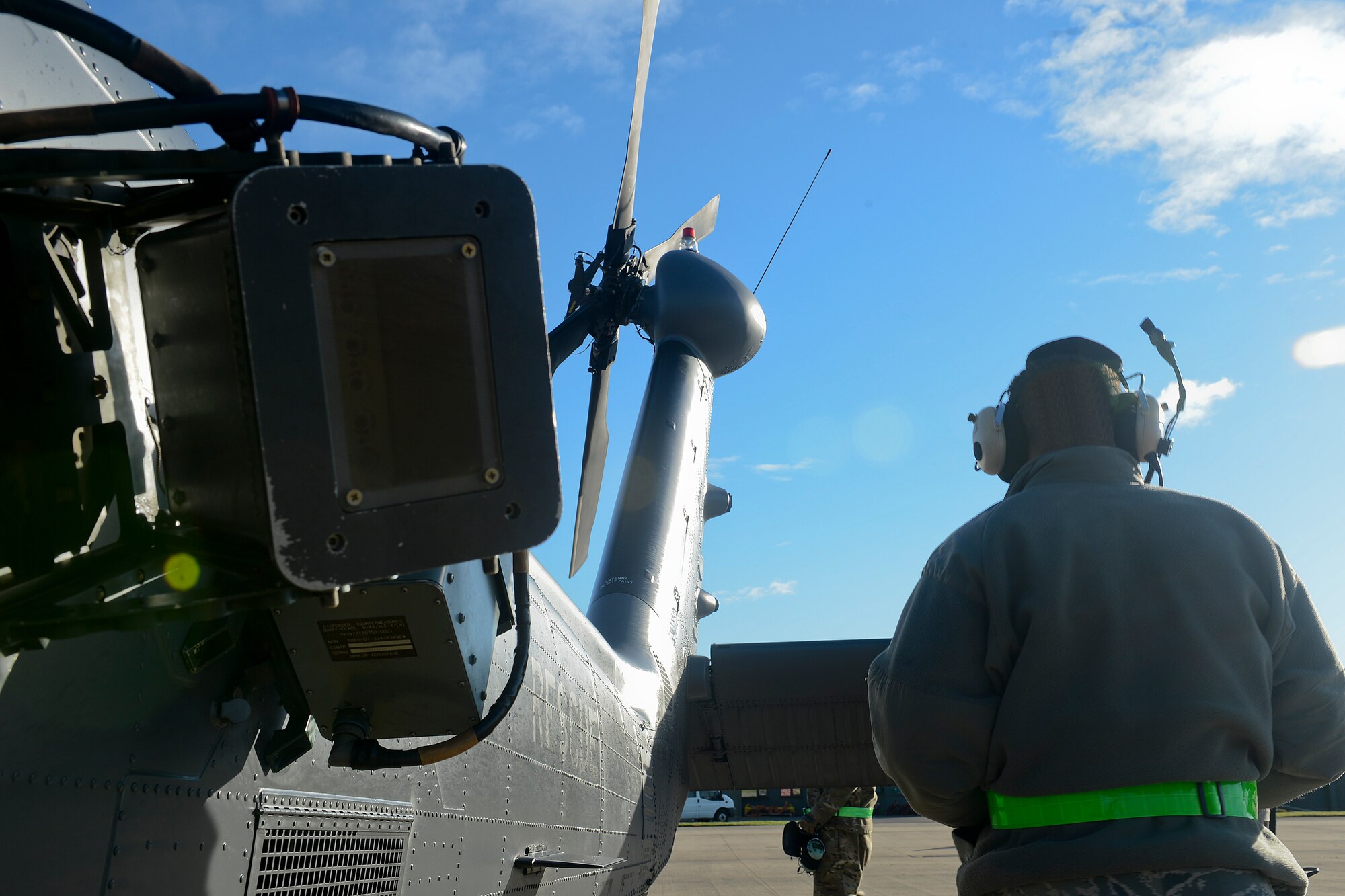 An Airman assigned to the 748th Aircraft Maintenance Squadron checks over an HH-60G Pave Hawk at Royal Air Force Leeming, England, Nov. 19, 2013. The 56th Rescue Squadron and 748th AMXS participated in electronic warfare training over the RAF Spadeadam test range Nov. 18-22. Throughout the week, they honed their skills engaging potential threats. (U.S. Air Force photo by Airman 1st Class Trevor T. McBride/Released)  