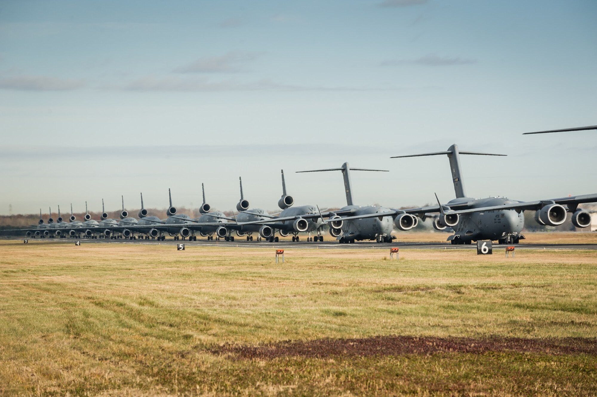 An "Elephant Walk," comprising 12 KC-10 Extenders and six C-17 Globemaster IIIs from the 305th Air Mobility Wing, was held Nov. 21, 2013, as part of a training exercise at Joint Base McGuire-Dix-Lakehurst, N.J.  The exercise enabled aircrew, maintenance, command post and operational support personnel to test their ability to launch a mass amount of aircraft in support of real-world operations. An Elephant Walk is a nose-to-tail taxi formation.