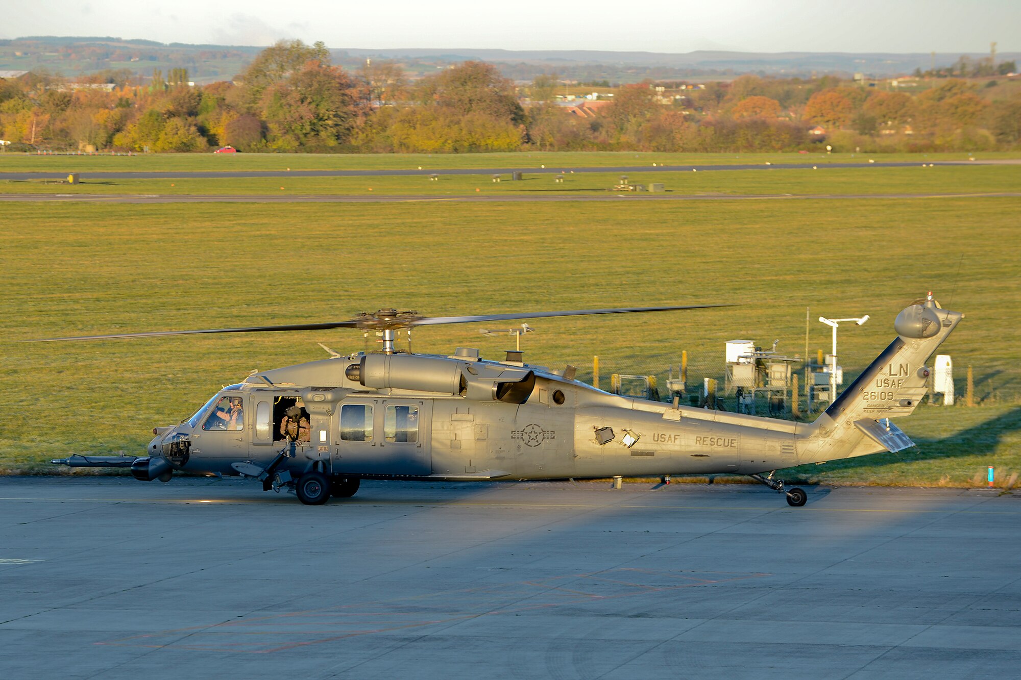 An HH-60G Pave Hawk assigned to the 56th Rescue Squadron taxis to the Royal Air Force Leeming, England, runway on the way to a training mission Nov. 19, 2013. The 56th RQS and 748th Aircraft Maintenance Squadron participated in electronic warfare training over the RAF Spadeadam test range Nov. 18-22. Throughout the week, they honed their skills engaging potential threats. (U.S. Air Force photo by Airman 1st Class Trevor T. McBride/Released) 