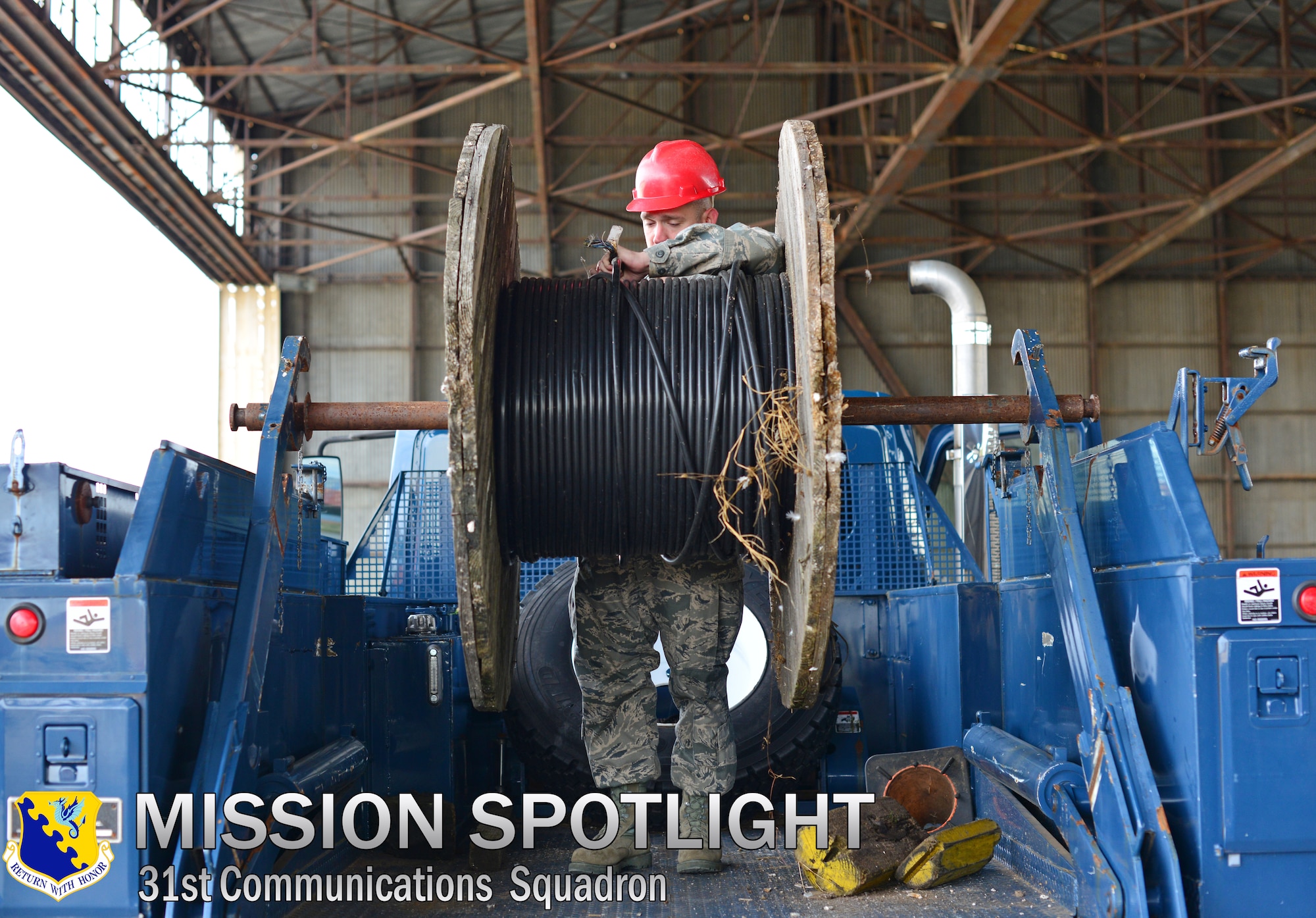 Staff Sgt. Scott Gingrich, 31st Communications Squadron cable and maintenance supervisor, prepares to tie off a reel of cable, Nov. 13, at Aviano Air Base, Italy. Cable and antenna maintainers are responsible for maintaining Aviano's communication infrastructure. (U.S. Air Force photo/Senior Airman Briana Jones)